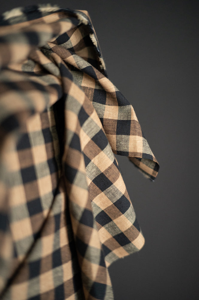A soft cotton and linen blend in a sophisticated check of black and coffee tones - Irish Coffee.
