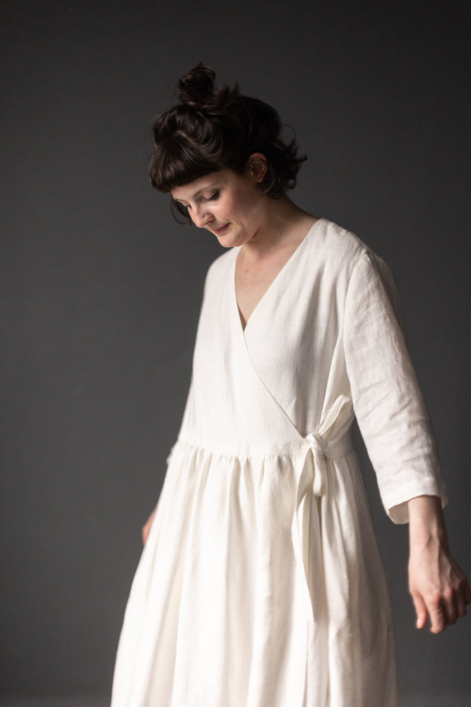 This is the Etta Wrap Dress made in 185gsm Linen colourway MILK