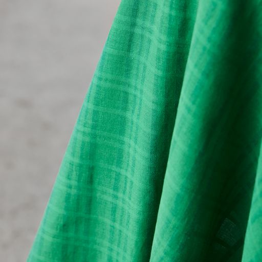 Light and silky soft sheer voile with woven grid texture. Green