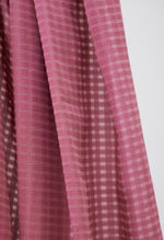 Light and sheer voile with a fine checkered texture. Punch colourway