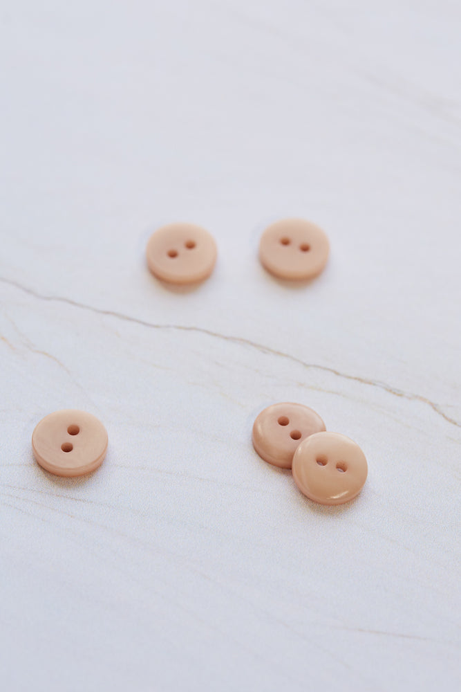 2-HOLE COROZO BUTTONS • Rose • 11m