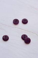 2-HOLE COROZO BUTTONS • Plum • 11mm