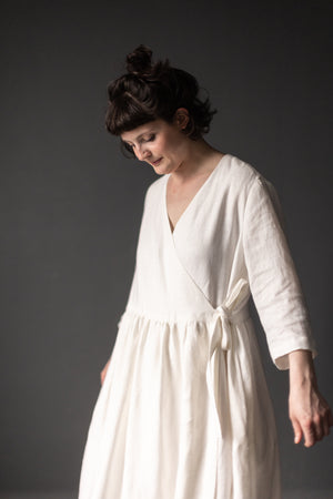 This is the Etta Wrap Dress made in 185gsm Linen colourway MILK