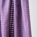 Light and sheer with a fine woven check texture. Mauve colourway.