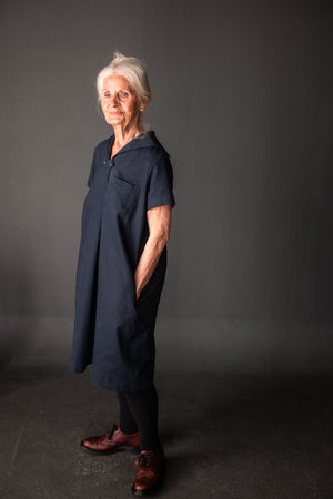 Brenda is wearing the dress in Navy Sanded Twill , she is a size 10 and 5.2.