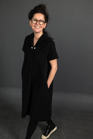 Katie is wearing the dress in 12oz Organic Black Twill she is a size 8 and is 5.4.