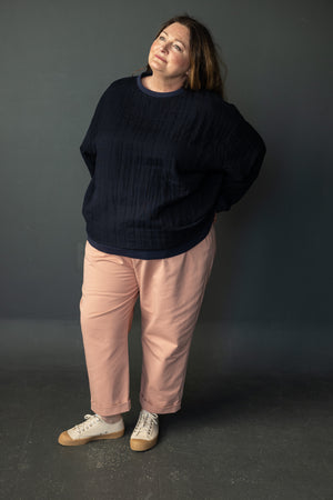 Claire wears a Sidney in Quink Jacquard Cotton with True Navy Rib. This is a size 26.