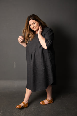 Clare is wearing a Dress Shirt in Scuttle Black 185 linen, and is wearing a size 26.