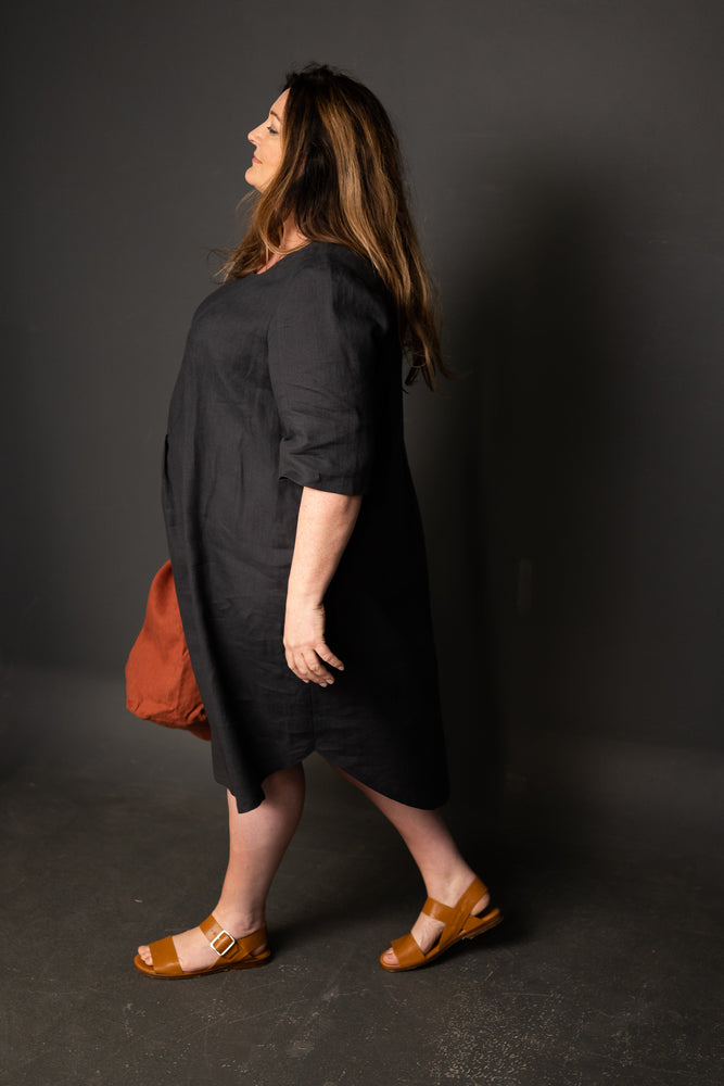 Clare is wearing a Dress Shirt in Scuttle Black 185 linen, and is wearing a size 26.