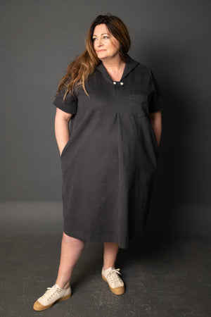 Claire is wearing the dress in 12oz Organic Twill Hastings Grey she is a size 26, and 5.8.