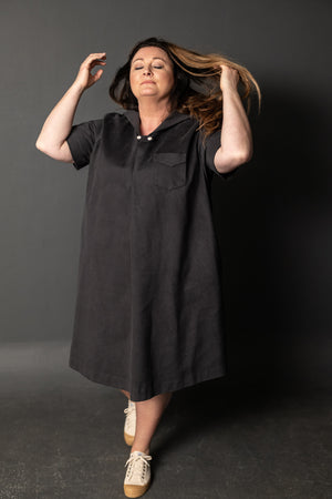 Claire is wearing the dress in 12oz Organic Twill Hastings Grey she is a size 26, and 5.8.