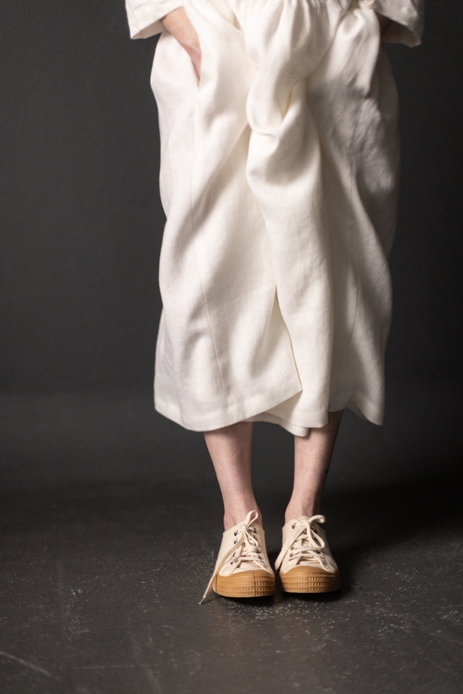 This is the Etta Wrap Dress made in 185gsm Linen colourway MILK