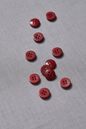 plain corozo buttons - berry