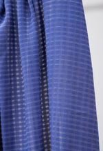 Light and sheer voile with a fine checkered texture. LAPIS