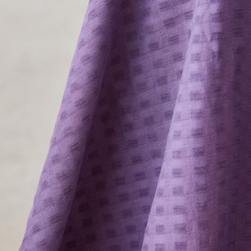 Light and sheer with a fine woven check texture. Mauve colourway.